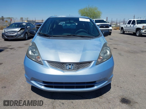 2009 Honda Fit z VIN JHMGE88259S037601, wystawiony jako IAAI lot #42428704 z przebiegiem 55 823 mil mil oraz . Historia ofert i sprzedaży dostępna na DreamBid. Obrazek 13.