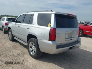 2015 Chevrolet Tahoe LT with VIN 1GNSCBKC9FR111984, listed as a IAAI auction lot 42003685 with 186,391 mi miles and . Bid and sale history available at DreamBid. Image 3.