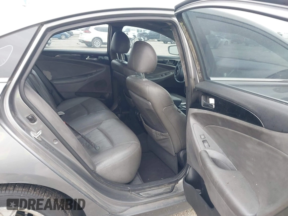 2013 Kia Optima EX with VIN 5XXGN4A75DG148460, listed as a IAAI auction lot 42414837 with 163,999 mi miles and . Bid and sale history available at DreamBid. Image 8.