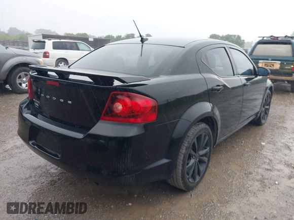 2013 Dodge Avenger SXT with VIN 1C3CDZCB5DN716005, listed as a IAAI auction lot 42644469 with 205,527 mi miles and . Bid and sale history available at DreamBid. Image 4.