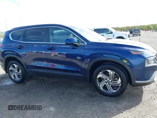 2022 Hyundai Santa Fe SE with VIN 5NMS14AJ6NH449145, listed as a IAAI auction lot 40491612 with 21,488 mi miles and . Bid and sale history available at DreamBid. Image 13.