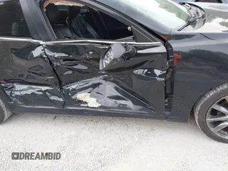 2018 Mazda 3 Touring z VIN 3MZBN1V36JM202498, wystawiony jako IAAI lot #42380709 z przebiegiem 108 930 mil mil oraz . Historia ofert i sprzedaży dostępna na DreamBid. Obrazek 17.