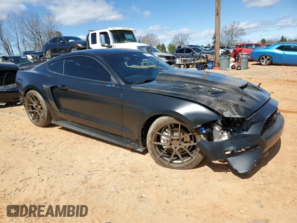 2021 Ford Mustang EcoBoost with VIN 1FA6P8TH4M5148947, listed as a Copart auction lot 48111835 with 44,812 mi miles and Salvage Title. Bid and sale history available at carsss.com. Image 4.