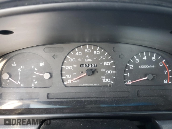 1995 Nissan Frontier XE z VIN 1N6HD16S2SC336866, wystawiony jako Copart lot #56041925 z przebiegiem 187 337 mil mil oraz Szkoda całkowita • Salvage title. Historia ofert i sprzedaży dostępna na DreamBid. Obrazek 9.