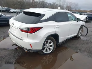 2017 Lexus RX with VIN 2T2BZMCA0HC101451, listed as a IAAI auction lot 41178229 with 61,756 mi miles. Bid and sale history available at carsss.com. Image 4.
