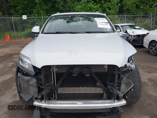 2015 Audi Q7 Premium Plus с VIN WA1LGAFE7FD027337, выставлен на аукционе IAAI как лот 42182400 с пробегом 82 269 миль миль и . История ставок и продаж доступна на DreamBid. Изображение 13.