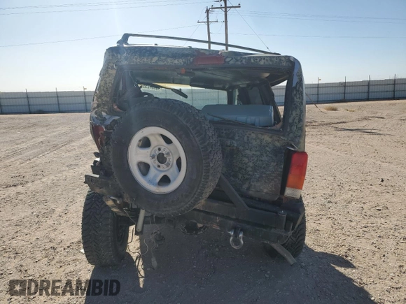 1999 Jeep Cherokee Sport with VIN 1J4FF68S6XL645028, listed as a Copart auction lot 48897255 with 218,552 mi miles and Salvage Title. Bid and sale history available at carsss.com. Image 6.