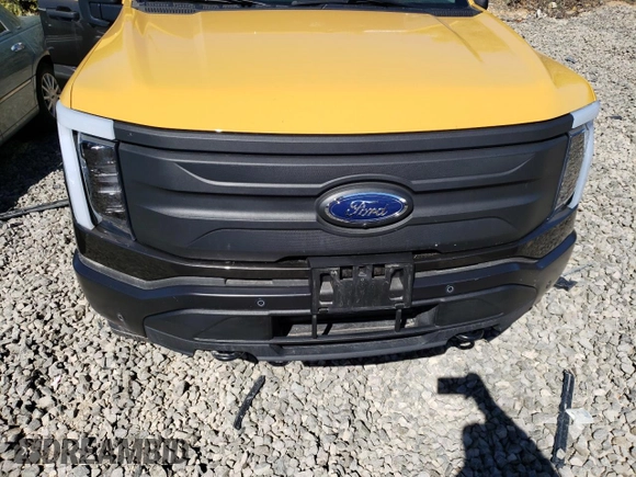 2023 Ford F-150 Lightning Pro with VIN 1FTVW1EL7PWG11261, listed as a Copart auction lot 47032775 with Not Provided miles and Salvage Title. Bid and sale history available at DreamBid. Image 11.