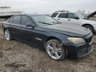 2011 BMW 7 Series 750i with VIN WBAKA8C58BCY36911, listed as a Copart auction lot 45759995 with 143,647 mi miles and Clean title. Bid and sale history available at DreamBid. Image 4.