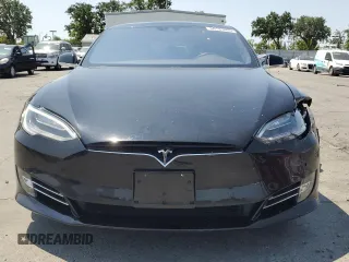 2016 Tesla Model S 90D z VIN 5YJSA1E29GF158774, wystawiony jako Copart lot #60143405 z przebiegiem Nie podano mil oraz Szkoda całkowita • Salvage title. Historia ofert i sprzedaży dostępna na DreamBid. Obrazek 5.