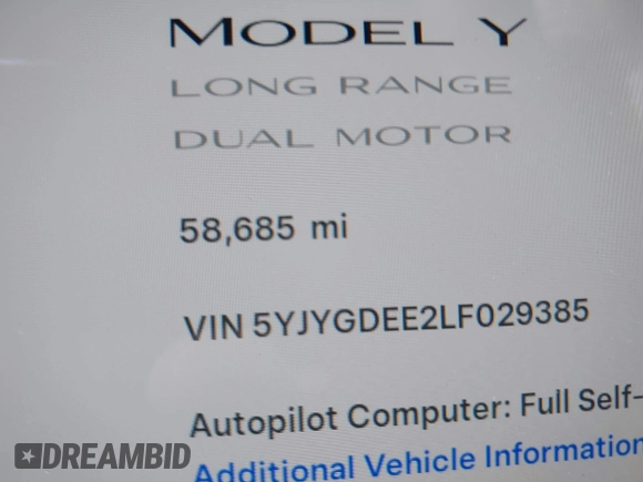 2020 Tesla Model Y Long Range with VIN 5YJYGDEE2LF029385, listed as a IAAI auction lot 42164786 with 58,685 mi miles and . Bid and sale history available at DreamBid. Image 7.