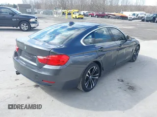 2016 BMW 4 Series 428i xDrive with VIN WBA4C9C56GG140427, listed as a IAAI auction lot 41886670 with 94,426 mi miles and . Bid and sale history available at carsss.com. Image 4.