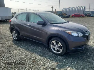 2018 Honda HR-V LX with VIN 3CZRU6H38JM104418, listed as a Copart auction lot 65933644 with 52,254 mi miles and Salvage Title. Bid and sale history available at carsss.com. Image 4.