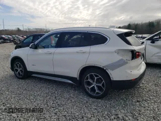 2017 BMW X1 xDrive28i with VIN WBXHT3C32H5F76601, listed as a Copart auction lot 49889965 with 95,655 mi miles and Salvage Title. Bid and sale history available at carsss.com. Image 2.