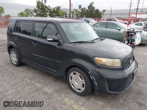 2009 Scion xB with VIN JTLKE50E791068407, listed as a IAAI auction lot 42075744 with 199,789 mi miles. Bid and sale history available at carsss.com. Image 1.