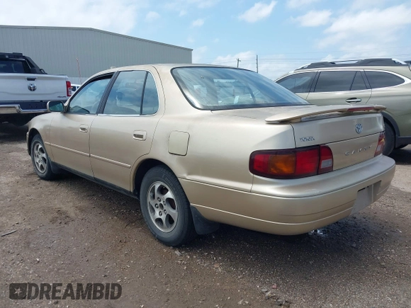 1996 Toyota Camry DX with VIN 4T1BG12K7TU781388, listed as a IAAI auction lot 42089118 with 196,988 mi miles. Bid and sale history available at carsss.com. Image 3.