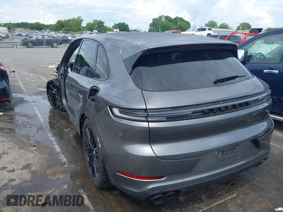 2025 Porsche Cayenne with VIN WP1AM2AY7SDA27408, listed as a IAAI auction lot 42462860 with 2,910 mi miles and . Bid and sale history available at DreamBid. Image 3.