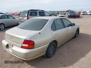 1998 Nissan Altima XE with VIN 1N4DL01DXWC253625, listed as a IAAI auction lot 41517801 with 194,609 mi miles. Bid and sale history available at carsss.com. Image 4.
