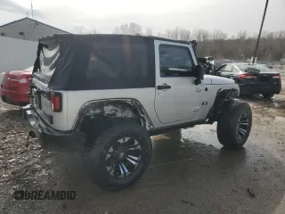 2008 Jeep Wrangler X with VIN 1J4FA241X8L629436, listed as a Copart auction lot 47578485 with 142,367 mi miles and Non Repairable. Bid and sale history available at DreamBid. Image 3.