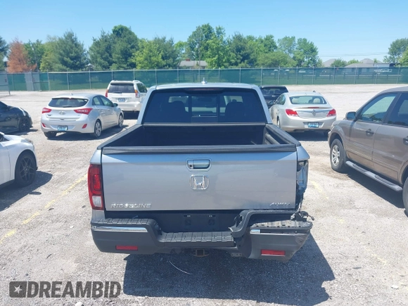 2020 Honda Ridgeline RTL with VIN 5FPYK3F5XLB019296, listed as a IAAI auction lot 42204290 with 48,197 mi miles and . Bid and sale history available at DreamBid. Image 16.