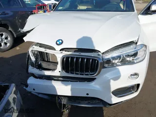 2019 BMW X6 xDrive35i with VIN 5UXKU2C57K0Z63351, listed as a IAAI auction lot 41637597 with 91,121 mi miles. Bid and sale history available at carsss.com. Image 6.