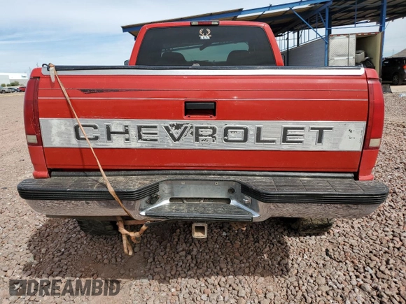 1997 Chevrolet Silverado 1500 with VIN 2GCEK19RXV1278018, listed as a Copart auction lot 49117675 with 218,026 mi miles and Salvage Title. Bid and sale history available at DreamBid. Image 6.