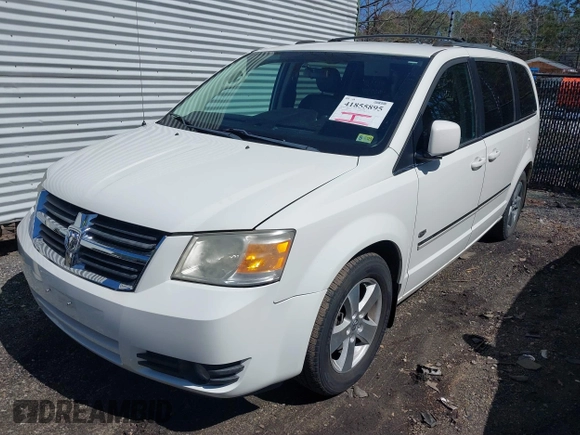 2009 Dodge Grand Caravan SXT z VIN 2D8HN54X99R651852, wystawiony jako IAAI lot #41855895 z przebiegiem 112 066 mil mil oraz . Historia ofert i sprzedaży dostępna na DreamBid. Obrazek 2.
