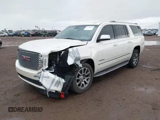 2015 GMC Yukon XL Denali with VIN 1GKS2JKJ2FR590502, listed as a IAAI auction lot 41758575 with 129,777 mi miles. Bid and sale history available at carsss.com. Image 2.