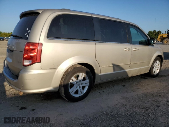 2013 Dodge Grand Caravan Crew with VIN 2C4RDGDG4DR567707, listed as a Copart auction lot 52731005 with 210,359 mi miles and Salvage Title. Bid and sale history available at DreamBid. Image 3.