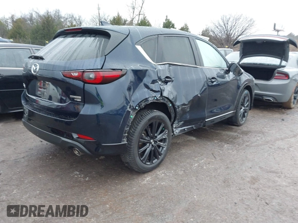 2022 Mazda CX-5 2.5 Turbo with VIN JM3KFBAY8N0635618, listed as a IAAI auction lot 41199038 with Not Provided miles and . Bid and sale history available at carsss.com. Image 4.