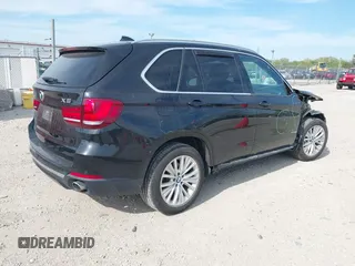 2016 BMW X5 xDrive35i z VIN 5UXKR0C56G0S85219, wystawiony jako IAAI lot #42213603 z przebiegiem 86 959 mil mil oraz . Historia ofert i sprzedaży dostępna na DreamBid. Obrazek 4.