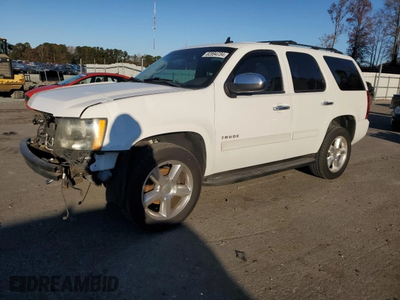 2013 Chevrolet Tahoe LS with VIN 1GNSCAE09DR340125, listed as a Copart auction lot 82894734 with 214,909 mi miles and Salvage title. Bid and sale history available at DreamBid. Image 1.