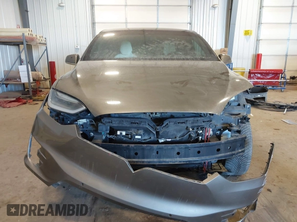 2016 Tesla Model X 70D with VIN 5YJXCBE27GF004974, listed as a IAAI auction lot 41630556 with 167,709 mi miles. Bid and sale history available at carsss.com. Image 13.