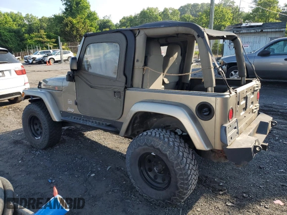 2003 Jeep Wrangler Sahara with VIN 1J4FA59S83P318057, listed as a Copart auction lot 58781495 with 102,571 mi miles and Clean title. Bid and sale history available at DreamBid. Image 2.