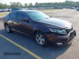 2015 Kia Optima LX with VIN 5XXGM4A72FG480748, listed as a IAAI auction lot 42685283 with 136,023 mi miles and . Bid and sale history available at DreamBid. Image 1.