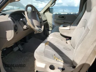 2001 Ford F-150 XL with VIN 1FTRX18L01KE64063, listed as a Copart auction lot 51500775 with 326,070 mi miles and Salvage title. Bid and sale history available at DreamBid. Image 7.