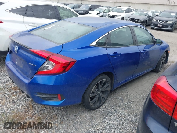 2021 Honda Civic Sport with VIN 2HGFC2F87MH554620, listed as a IAAI auction lot 41743596 with 52,327 mi miles and . Bid and sale history available at DreamBid. Image 4.