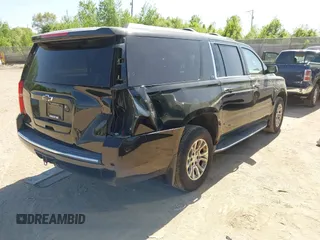 2016 Chevrolet Suburban LTZ with VIN 1GNSKJKC5GR328723, listed as a IAAI auction lot 42253610 with 183,423 mi miles and . Bid and sale history available at DreamBid. Image 4.