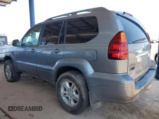 2006 Lexus GX 470 z VIN JTJBT20X960120748, wystawiony jako Copart lot #60102405 z przebiegiem 242 521 mil mil oraz Czysty tytuł • Clean title. Historia ofert i sprzedaży dostępna na DreamBid. Obrazek 2.