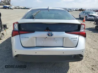 2021 Toyota Prius L Eco with VIN JTDKAMFU8M3145511, listed as a Copart auction lot 55166085 with 14,846 mi miles and Salvage Title. Bid and sale history available at DreamBid. Image 6.