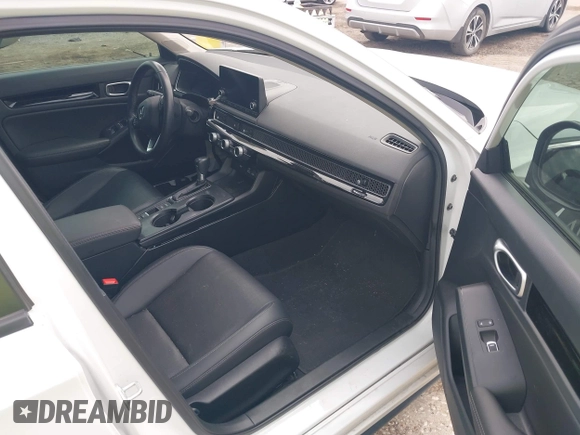 2023 Honda Civic EX-L with VIN 19XFL1H70PE014510, listed as a IAAI auction lot 42395890 with 14,163 mi miles and . Bid and sale history available at DreamBid. Image 5.