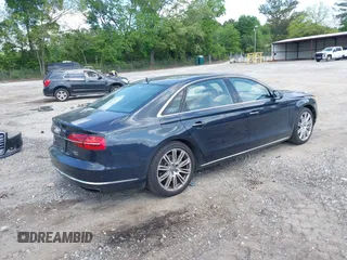2015 Audi A8 4.0T with VIN WAU32AFD4FN002477, listed as a IAAI auction lot 42157514 with 151,729 mi miles and . Bid and sale history available at DreamBid. Image 4.