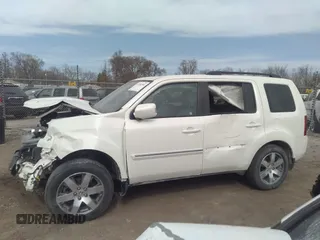 2015 Honda Pilot Touring with VIN 5FNYF4H9XFB047607, listed as a IAAI auction lot 41781534 with 157,252 mi miles. Bid and sale history available at carsss.com. Image 14.