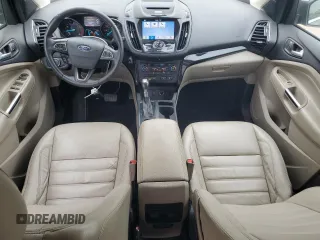 2017 Ford Escape Titanium with VIN 1FMCU0J98HUF09588, listed as a Copart auction lot 48988765 with 101,887 mi miles and Salvage Title. Bid and sale history available at DreamBid. Image 8.