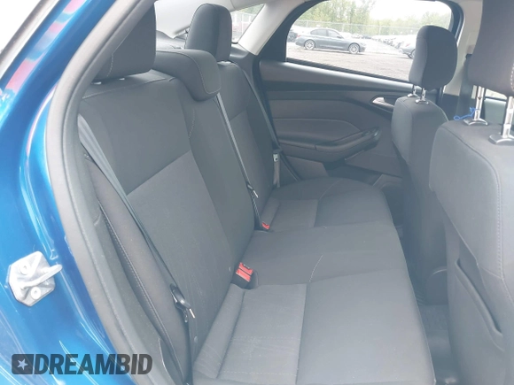 2018 Ford Focus SE z VIN 1FADP3F29JL235302, wystawiony jako IAAI lot #42262964 z przebiegiem 85 127 mil mil oraz . Historia ofert i sprzedaży dostępna na DreamBid. Obrazek 8.