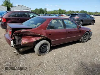 2001 Toyota Camry LE z VIN JT2BF22K610295178, wystawiony jako Copart lot #68538524 z przebiegiem 507 822 mil mil oraz Szkoda całkowita • Salvage title. Historia ofert i sprzedaży dostępna na DreamBid. Obrazek 3.