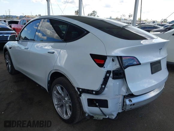 2024 Tesla Model Y Long Range with VIN 7SAYGDEE5RA222333, listed as a IAAI auction lot 41944404 with 12,176 mi miles. Bid and sale history available at carsss.com. Image 3.
