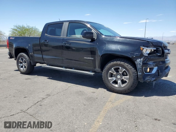 2015 Chevrolet Colorado 2WD Z71 with VIN 1GCGSCE32F1250923, listed as a Copart auction lot 64321225 with 196,595 mi miles and Salvage title. Bid and sale history available at DreamBid. Image 4.