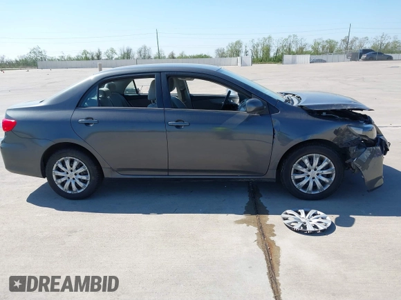 2012 Toyota Corolla L with VIN 2T1BU4EE9CC831743, listed as a IAAI auction lot 41870966 with 166,548 mi miles. Bid and sale history available at carsss.com. Image 13.