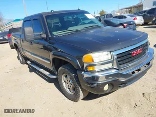 2004 GMC Sierra 1500 Crew Cab SLE with VIN 2GTEK13T941431569, listed as a IAAI auction lot 41715447 with 195,687 mi miles. Bid and sale history available at carsss.com. Image 1.